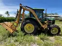 2010 John Deere 6430 tractor with boom mower