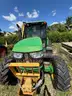 2015 John Deere 6105M tractor with boom mower