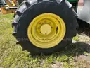 2015 John Deere 6105M tractor with boom mower