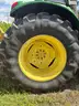 2015 John Deere 6105M tractor with boom mower