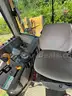 2015 John Deere 6105M tractor with boom mower
