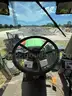 2015 John Deere 6105M tractor with boom mower