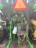 2015 John Deere 6105M tractor with boom mower