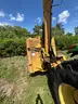 2015 John Deere 6105M tractor with boom mower