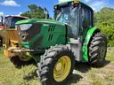 2015 John Deere 6105M tractor with boom mower