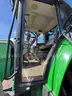 2015 John Deere 6105M tractor with boom mower