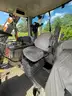 2015 John Deere 6105M tractor with boom mower