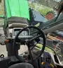 2015 John Deere 6105M tractor with boom mower