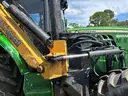 2015 John Deere 6105M tractor with boom mower