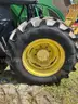 2015 John Deere 6105M tractor with boom mower
