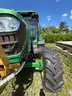 2015 John Deere 6105M tractor with boom mower