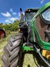 2015 John Deere 6105M tractor with boom mower