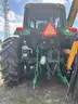 2015 John Deere 6105M tractor with boom mower