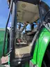 2015 John Deere 6105M tractor with boom mower