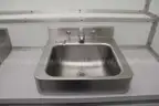 Portable shipping container/shower and bath housing unit.