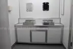 Portable shipping container/shower and bath housing unit.