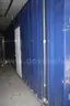 Portable shipping container/shower and bath housing unit.