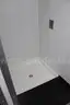 Portable shipping container/shower and bath housing unit.