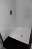Portable shipping container/shower and bath housing unit.