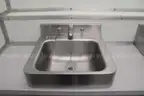 Portable shipping container/shower and bath housing unit.