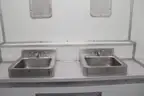 Portable shipping container/shower and bath housing unit.