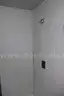 Portable shipping container/shower and bath housing unit.