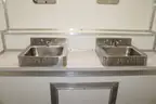 Portable shipping container/shower and bath housing unit.