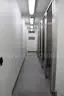 Portable shipping container/shower and bath housing unit.