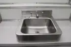 Portable shipping container/shower and bath housing unit.