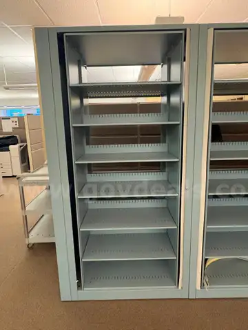 4 Filing Cabinets (Rotating Shelves)