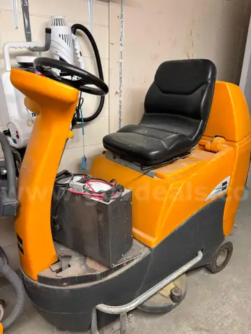 Ride on Floor Cleaner Older unit, with new batteries. Value in the new batteries.