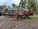 Ditch Witch Trencher with Backhoe attachment