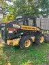 2008 New Holland skid steer, Damaged