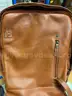 Helmet, back packs, used tools, clothing and new cologne