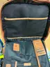 Helmet, back packs, used tools, clothing and new cologne