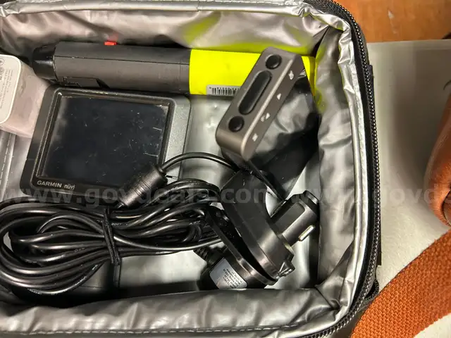Helmet, back packs, used tools, clothing and new cologne