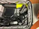 Helmet, back packs, used tools, clothing and new cologne