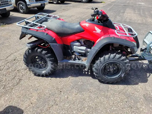 Honda Ricon 4x4 with Plow