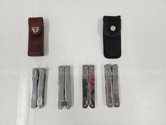 Lot of Victorinox SwissTool Multi-Tools (4)