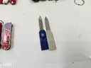 Lot of Small Swiss Knives (Approx 242)