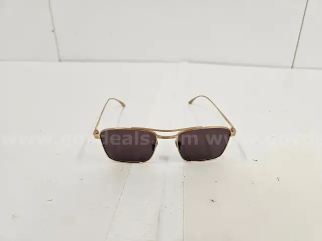 Pair of Masunaga Sunglasses