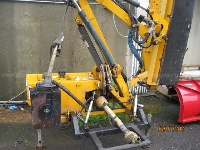 Boom flail mower for Trackless sidewalk tractor.