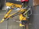 Boom flail mower for Trackless sidewalk tractor.