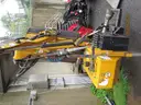 Boom flail mower for Trackless sidewalk tractor.