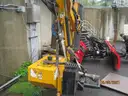 Boom flail mower for Trackless sidewalk tractor.