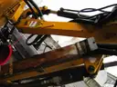 Boom flail mower for Trackless sidewalk tractor.