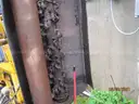 Boom flail mower for Trackless sidewalk tractor.