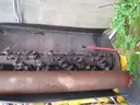 Boom flail mower for Trackless sidewalk tractor.