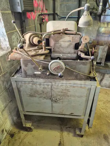 Valve facing grinding machine