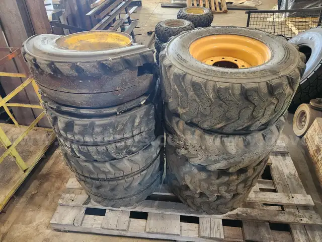 Lot of 10 Used Skid Loader Rims and Tires